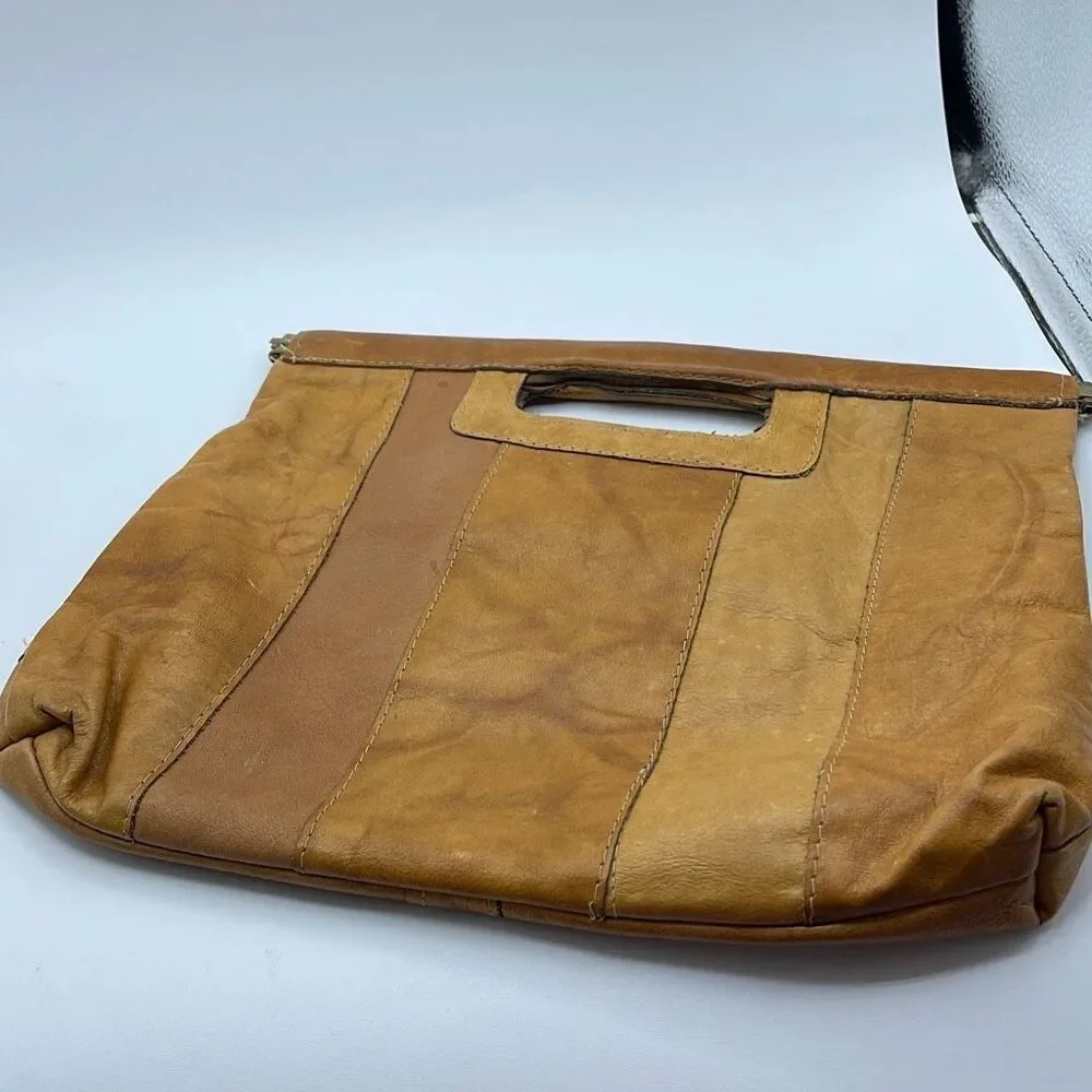 Vintage boho Leather Made in Hong Kong top handle bag.